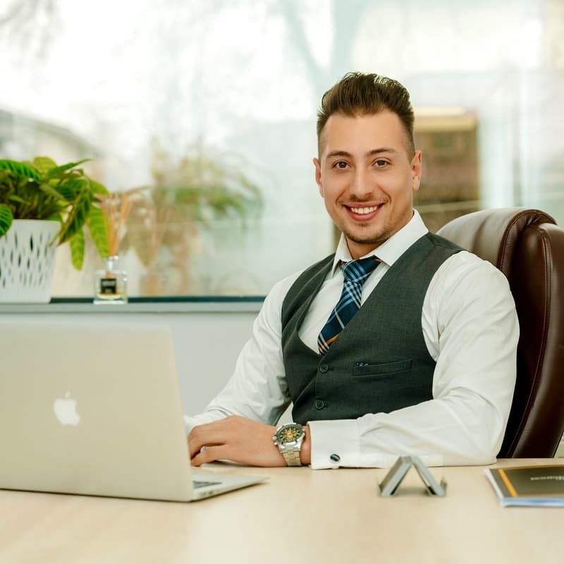 Executive Studio Portrait — Classic Seated Stance